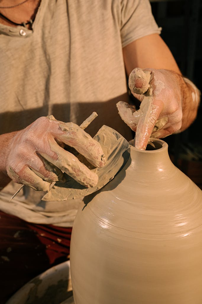 Person Making Clay Pot