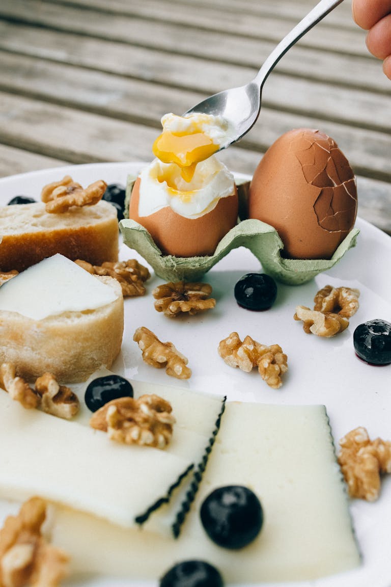 Brown and Green Pastry on White Ceramic Plate