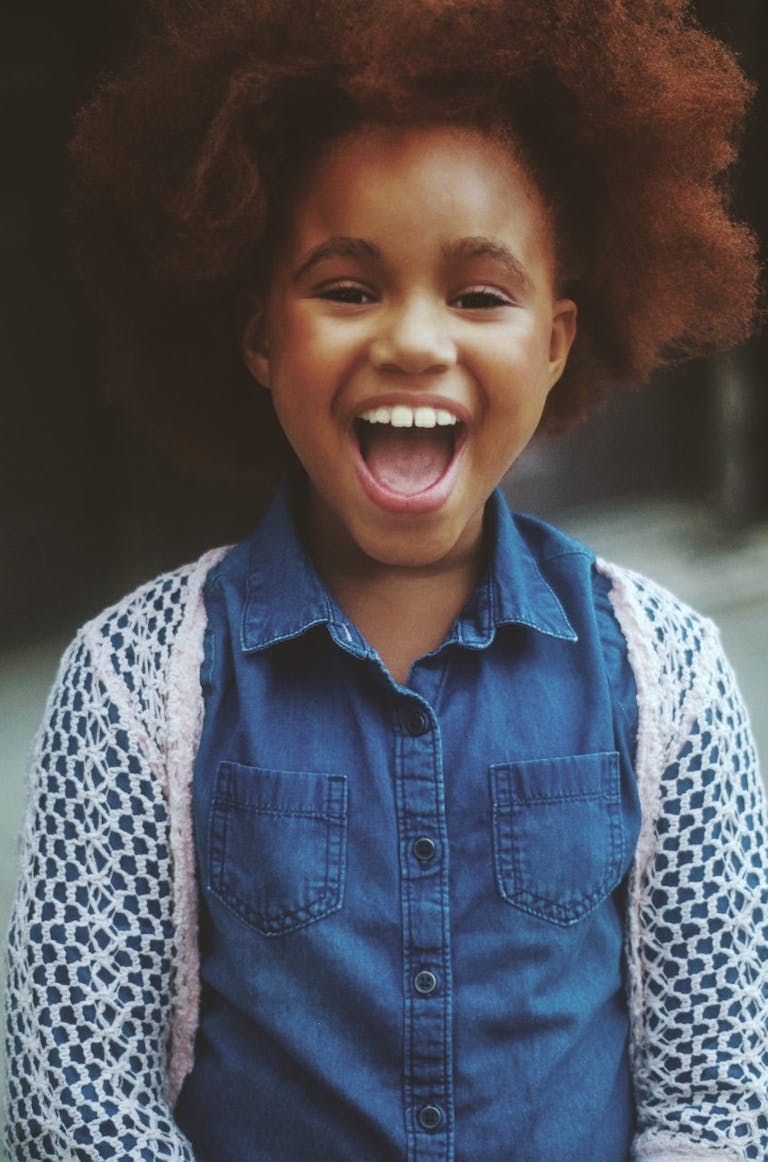 Girl Wearing Blue Denim Dress Shirt