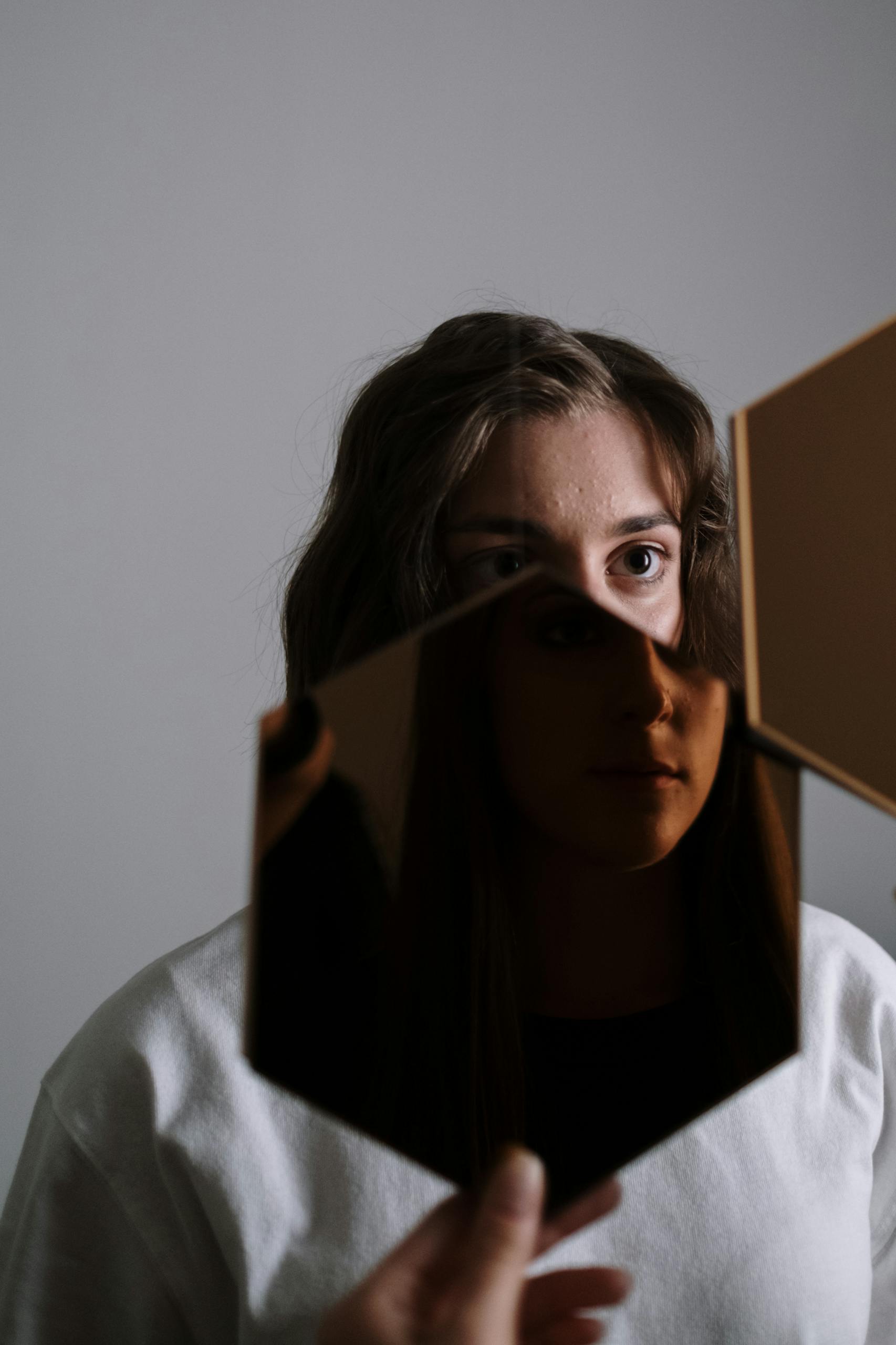 Woman in White Shirt Wearing Eyeglasses